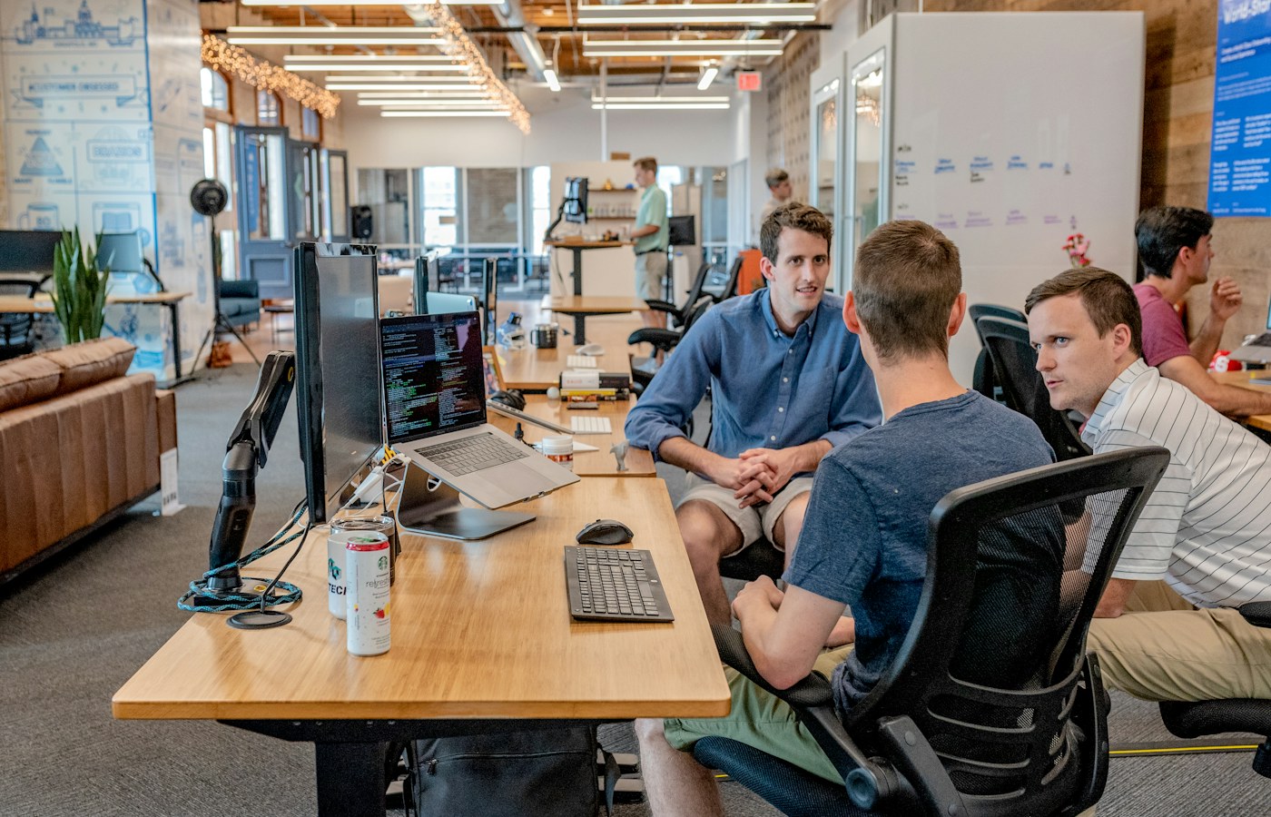 Professionals reviewing business information together in an office